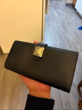 Yves Saint Laurent black Leather continental Wallet with silver hardware